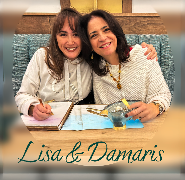 lisa and Damaris photi at dinner -sitting in a theater V2 better V3